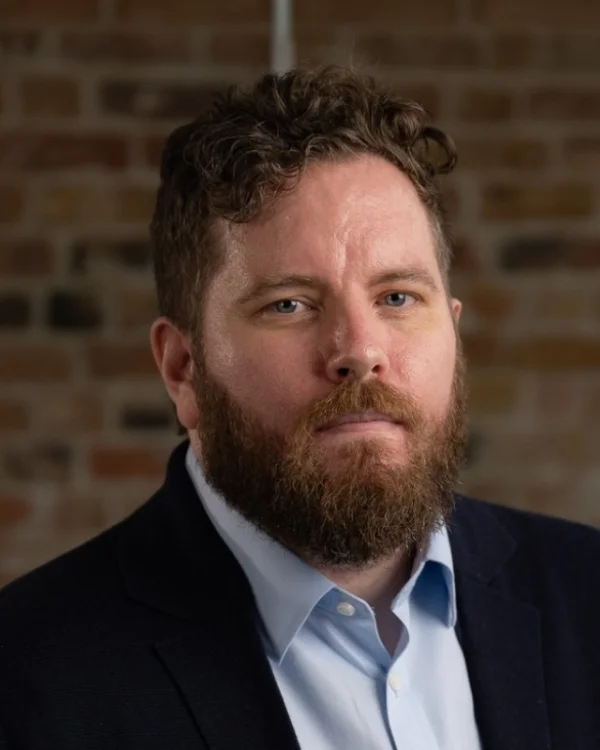 Portrait of Dr Julian Perry.