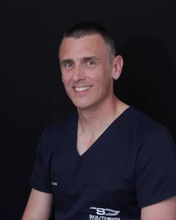 Portrait of Dr Julian Perry.