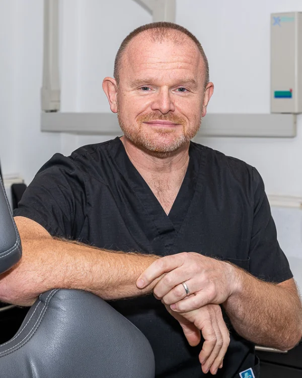 Portrait of Dr Julian Perry.