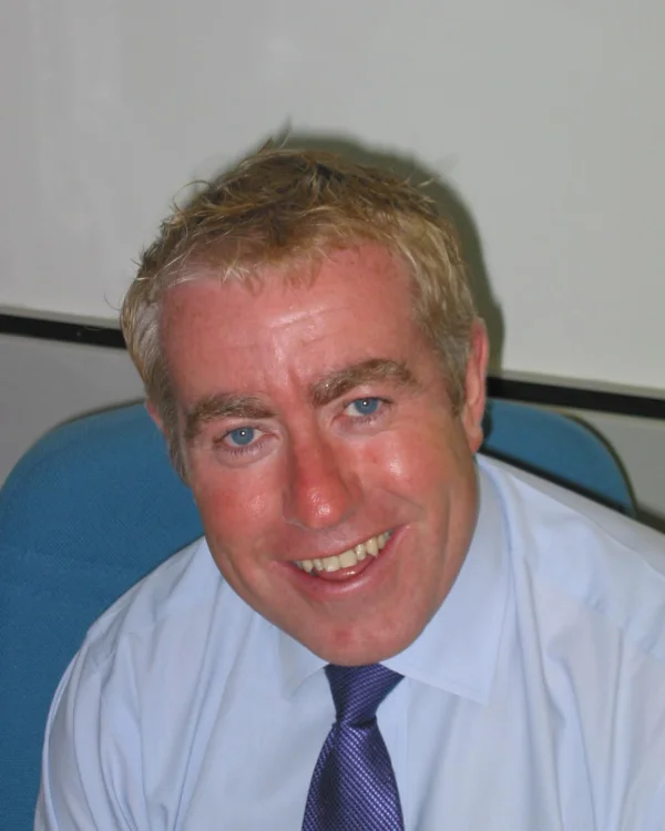 Portrait of Dr Julian Perry.